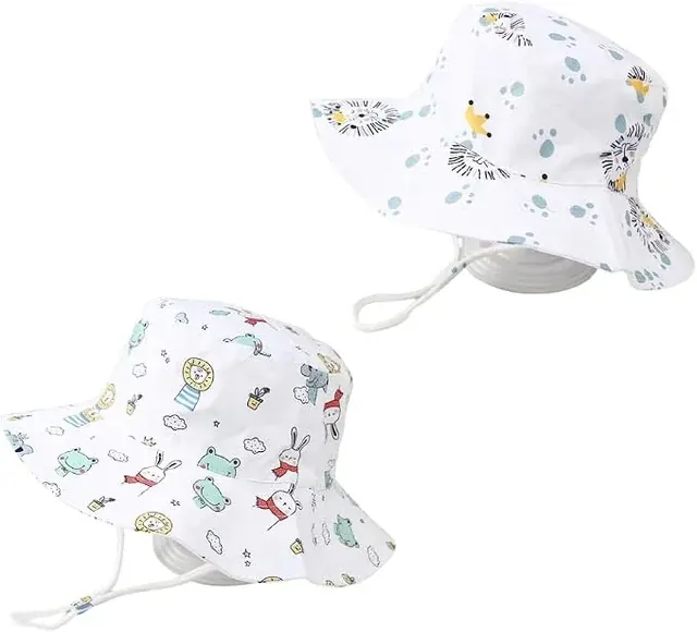 Two white children's sun hats with colorful cartoon prints